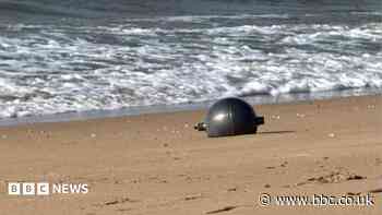 Australia probes mystery space balls that washed up on beach