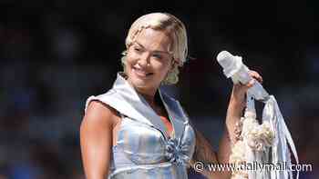 Rita Ora takes to the stage in a satin corset and frilly hotpants for performance at the ICC Women's T20 World Cup final at Lord's