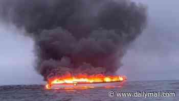 Four people rescued from yacht as vessel bursts into flames off the English coast