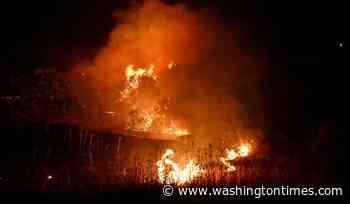 A fast-moving wildfire near Greece's Thessaloniki sparks evacuations as smoke blankets suburbs