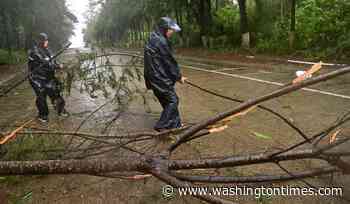 Heavy rains leave 5 dead in China's north while Tropical Storm Maysak hits the south and Vietnam