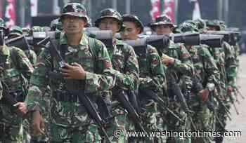 Indonesian troops recover body of U.S. pilot slain by rebels in West Papua