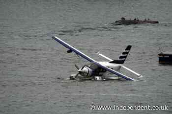 Eight people rescued after seaplane comes down in East River off New York City