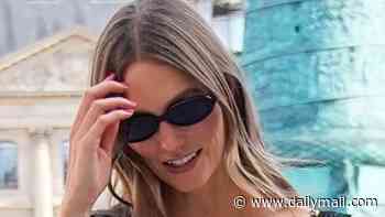 Beaming Karlie Kloss heads to a fitting for Haute Couture Fashion Week in Paris after making amends with Taylor Swift to attend her lavish wedding