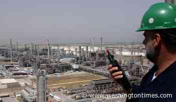 7 OPEC+ countries agree to expand monthly oil production modestly as prices slide