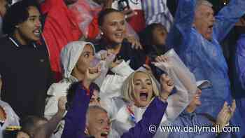 Kate Kane and Megan Pickford celebrate in the stands as their Three Lions husbands take on Mexico City
