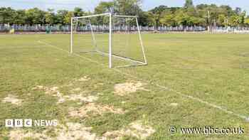 Football pitches 'like concrete' due to extreme heat, say clubs