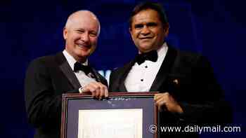 Disgraced footy 'legend' Nicky Winmar's Hall of Fame place under review following assault conviction