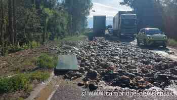 Road closed as lorry sheds more than 20 tonnes of food waste