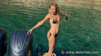 Kate Hudson, 47, shows off her toned form in a skimpy black bikini on family summer break to Greece