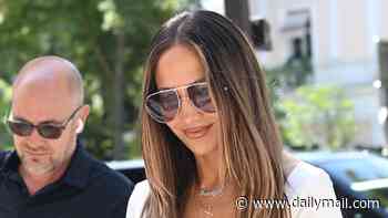 Jennifer Lopez turns heads in a cream dress and $70k Hermès bag as she jets from Taylor Swift's wedding to Paris Haute Couture Fashion Week