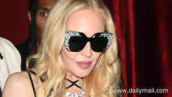Madonna, 67, sports a leather corset and fishnet tights as she parties with toyboy Akeem Morris, 30, her son Rocco Ritchie and daughter Lourdes Leon on star-studded London night out