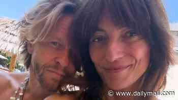 Davina McCall, 58, shows off her incredible abs as she poses in a bikini alongside husband Michael Douglas, 49, during loved-up getaway
