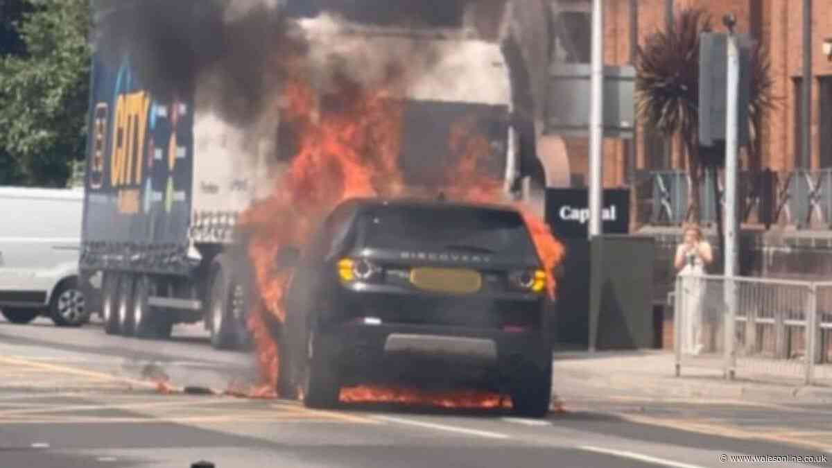 Dramatic car fire shuts busy Cardiff city centre road