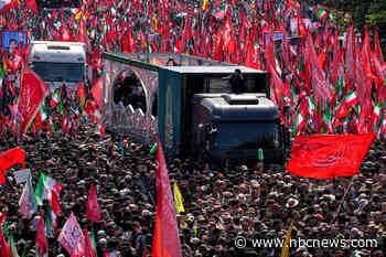 Supreme leader’s coffin creeps through crowds in Tehran as Trump effigy is hanged