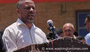 Hamas dissolves its government in Gaza to transfer power to a U.N.-backed committee
