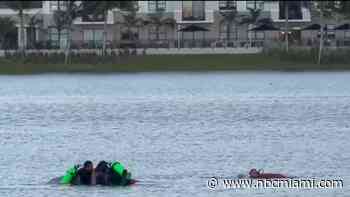 Woman and dog rescued from lake in Miami Lakes, fire officials say