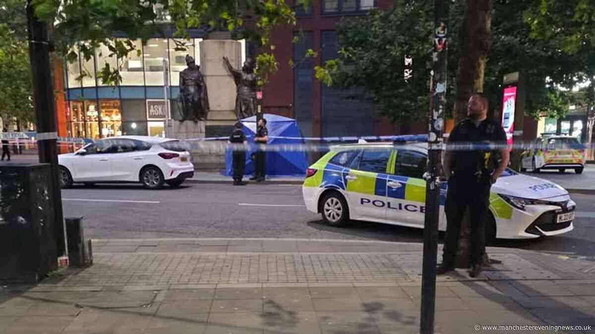 Police tape off area with blue tent erected following Piccadilly Gardens incident