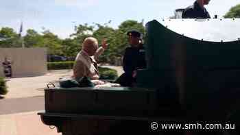 King Charles III rides in a Challenger 2 Main Battle Tank