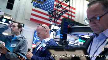 Wall Street closes higher as chip stocks rally