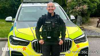 PC praised for squeezing through gap to save man