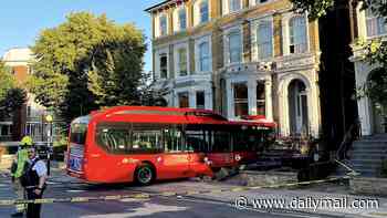 Pictured: Aftermath as electric bus ploughs into front of house in Notting Hill, leaving pensioners homeless