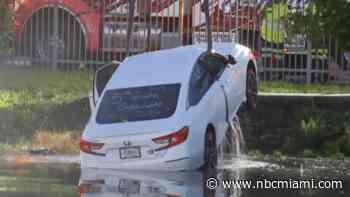 Suspect in custody after stolen car rolls into Sunrise canal, police say