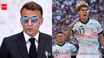 Evening news wrap: Close shave for Macron in Syria; Iran takes jab at US after FIFA ouster, and more