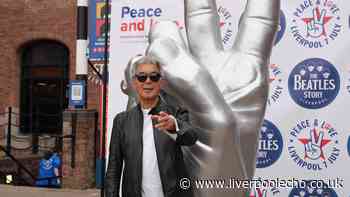 Huge crowds gather at Liverpool's Albert Dock to honour Scouse legend