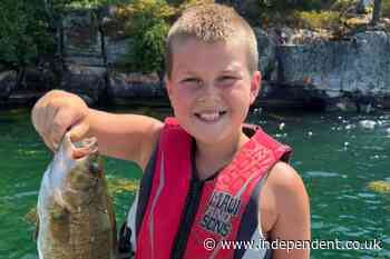 Dad wrestles away alligator to save his 11-year-old son after it bit his hand off during fishing trip