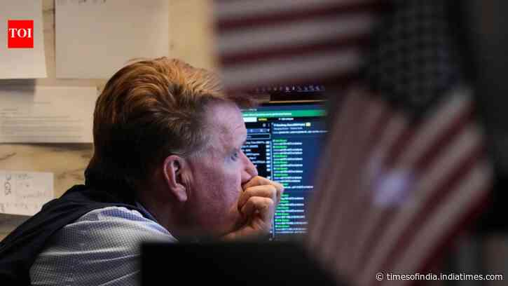 Wall Street sees mixed performance; Dow rises 0.3%, Nasdaq falls 0.8% as AI stocks slide