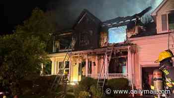 Hero dad died after rushing into burning $800,000 home to save his son, 10... only for investigators to discover that youngster was safely outside the whole time
