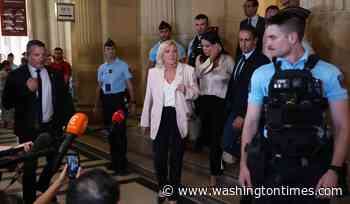 Le Pen says she'll run for French presidency next year despite court-ordered monitor