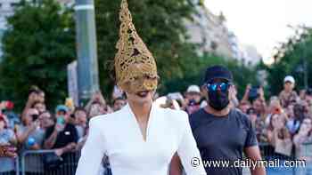 Zendaya wears bizarre Eiffel Tower-inspired mask as she joins leggy Charlize Theron and pregnant Anne Hathaway at star-studded The Odyssey premiere in Paris