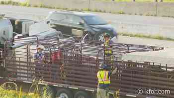 Semi carrying 62 heads of cattle overturns near Tinker