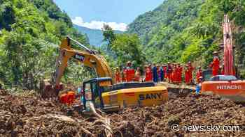 At least five dead and 12 more trapped after China landslide