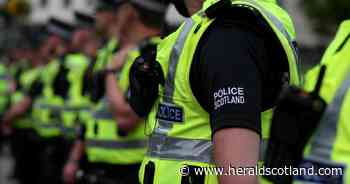 Man arrested after police face off with crowd at Glasgow flat block protest