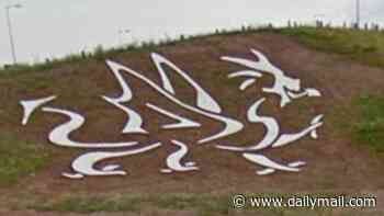 56ft 'Welcome to Wales' dragon carved into the roadside disappears after being covered in grass due to 'lack of maintenance'