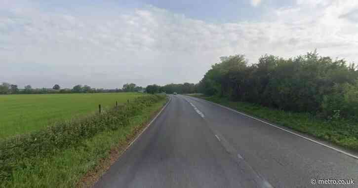 Teen dies and another in hospital after lorry collides with car on main road