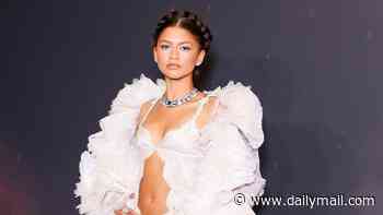 Zendaya looks every inch the Greek goddess in a racy white lace dress as she leads the stars at The Odyssey premiere in Paris