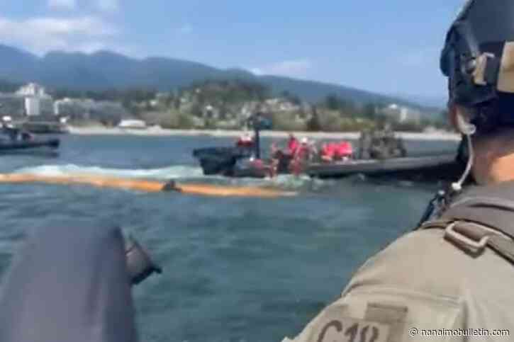 RCMP rescue 11 people from overturned canoe in Burrard Inlet