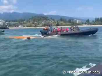 Boaters rescued after canoe capsizes near Ambleside Beach