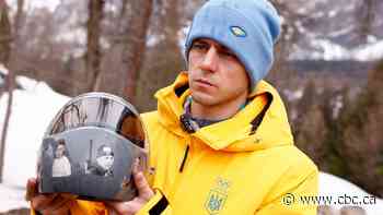 Ukrainian athlete decries IOC's 'shameful' decision to lift Russian Olympics suspension