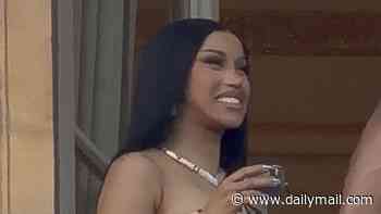 Cardi B, 33, sparks romance rumors with hunky new sports star, 26, at Paris Fashion Week... five months after split from NFL's Stefon Diggs