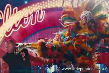 Top movie stuntmen sue over clip of Elton John kicking them in the face