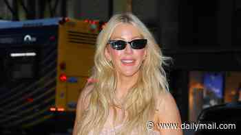 Ellie Goulding, 39, turns heads in a sheer lace top as she enjoys a date night in New York with boyfriend Beau Minniear, 29, after attending Taylor Swift's wedding