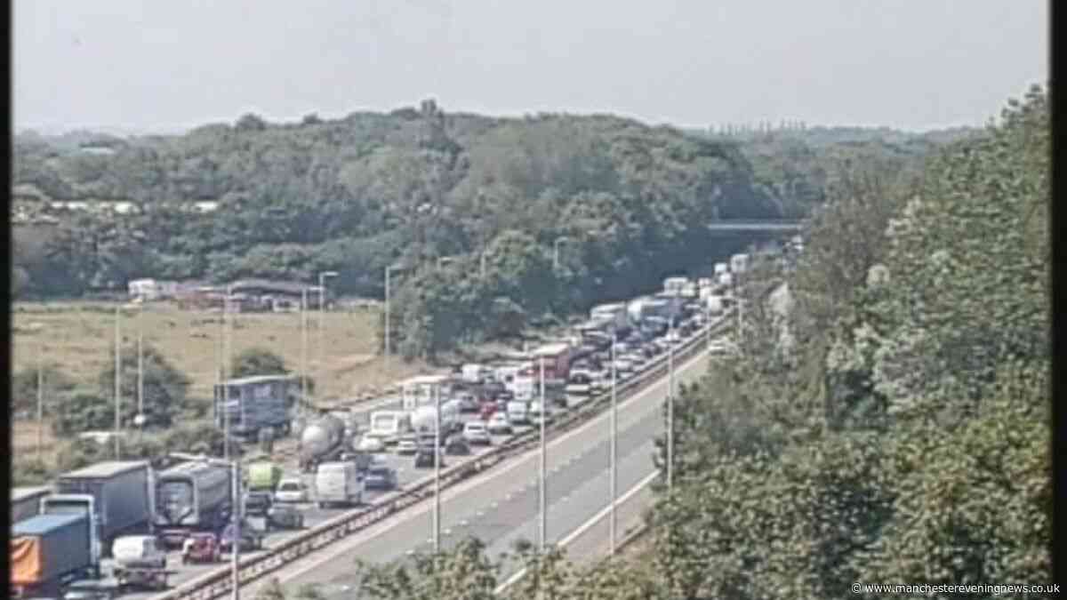 M56 LIVE as motorway carriageway shut following crash with vehicle overturned
