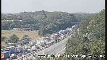 M56 LIVE as motorway carriageway shut following crash with vehicle overturned
