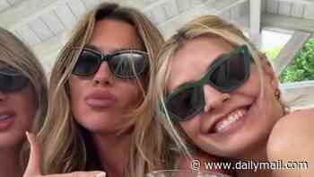 Holly Willoughby and Abbey Clancy enjoy a boozy girls' day out as they drink margaritas and pose for fun videos