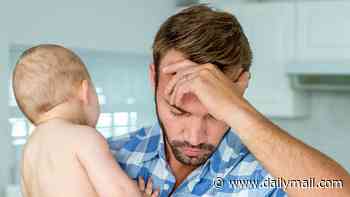 New fathers ALSO suffer postnatal depression, research claims - but the symptoms are different to those affecting women